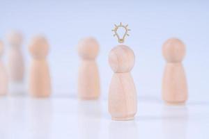 Business Leader with Successful Team, Human Shaped Wood Mockup stand out from the team photo