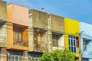 Colorful shabby old and dirty apartments Don Mueang Bangkok Thailand. photo
