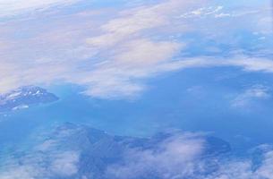 Flying over Thailand panoramic view of islands beaches turquoise waters. photo