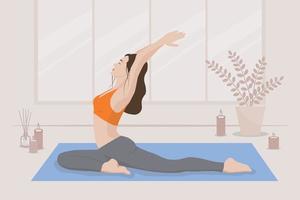 A light-skinned young woman does yoga in a bright room with candles vector