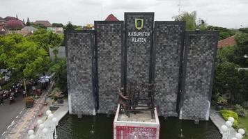 Aerial view of Batik statue in Klaten City with name sign in. video