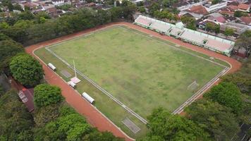 Aerial View green Stadium in the city of Klaten, Indonesia.