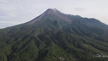 Aerial view of active Merapi mountain with clear sky in Indonesia video