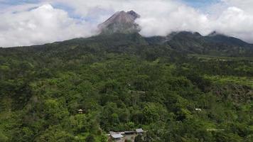 Aerial view of active Merapi mountain with clear sky in Indonesia