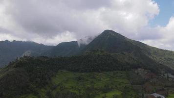Aerial view of mountain with green scenery in Sindoro vulcano video