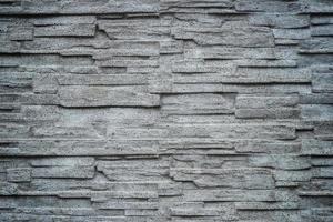 Pyrenean stone panels background. Artificial concrete panels flat surface. photo