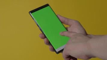 Smartphone screen. Smart phone isolated on color background. video