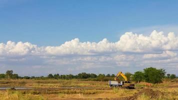 Agricultural with backhoe photo