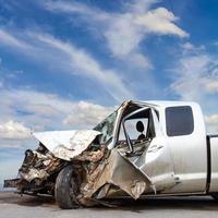 car demolished Cloudy sky photo