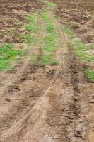 Wheel tracks of agricultural land photo