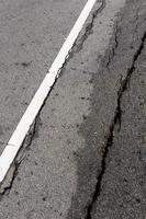 Wet asphalt cracks