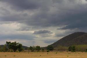 Barren mountains cloudy photo