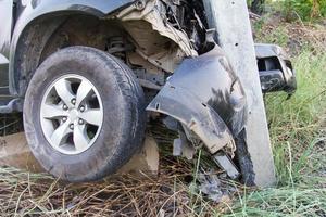 Car hit a power pole photo