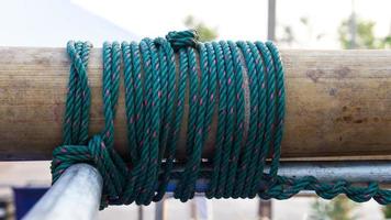 Nylon rope tied to a bamboo photo