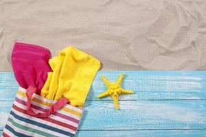 Sand copy space. Sand background top view. Sand copy space. Sand background top view. Beach towels and starfish photo