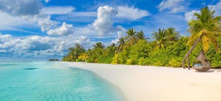 Maldives island beach. Tropical landscape of summer scenery, white sand with palm trees. Luxury travel vacation destination. Exotic beach landscape. Amazing nature, relax, freedom nature template photo