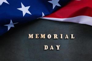 American flag on dark background. USA Memorial Day concept. Remember and honor. photo