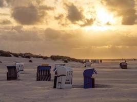 sundown at the beach of Juist photo