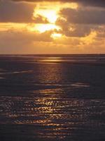 sundown at the beach of Juist photo