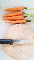 The baby carrot on the chopping block. photo