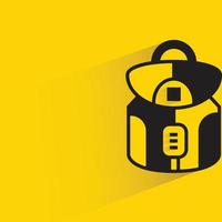 icono de mochila sobre fondo amarillo vector