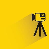 video camera on tripod icon vector