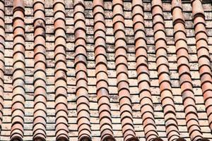 Ancient style of orange brick roof, Thailand. photo