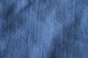 Dark blue textile background, indigo fabric cloth background. photo