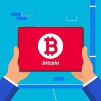 Hand holding black tablet device isolated on wall background. Pad tablet on human hands with bitcoin icon and index finger pointer touch the screen flat design vector illustration. Symbol mining sign.