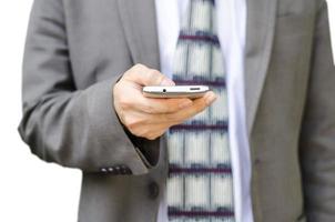 hombre de negocios usando un teléfono móvil inteligente foto