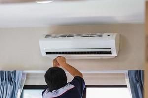 Air Conditioning Repair, Repairman ixing air conditioning system, Male technician service for repair and maintenance of air conditioners