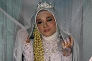 hermosa novia musulmana indonesia. foto