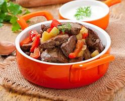 Roast chicken liver with vegetables photo