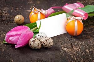 Happy Easter - flowers and colourful eggs photo