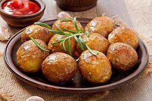 Baked potatoes with  rosemary photo