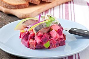 Herring salad with sour cream sauce photo