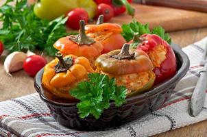 Stuffed peppers minced chicken with carrots with tomato sauce