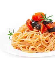 Spaghetti with tomato and olives photo
