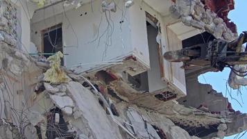 Hydraulic Breaker And Column Cutter Excavator Rear Machine Working in the Demolition of Old Apartment Houses video