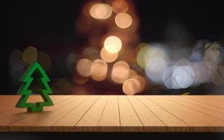 Wood table with christmas blurry bokeh light background. photo