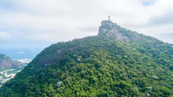 Rio de Janeiro, Rio de Janeiro, Brazil, Circa October 2019 Aerial view of Cristo Redentor, Christ the Redeemer Statue over Rio de Janeiro City, Brazil photo