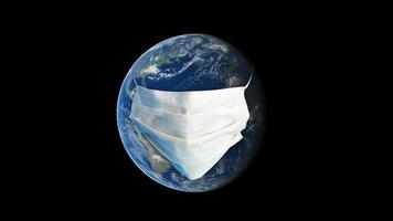 The earth with a surgical mask over it. Prevent sickness by wearing mask. Illustrates pandemic or epidemic, for example coronavirus spreading. 3D Rendering. photo