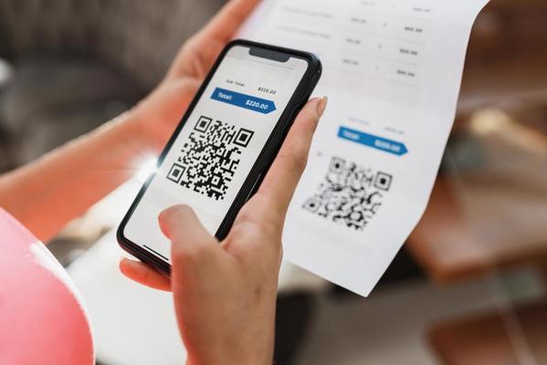 New form of payment of bills and bills in Brazil. Woman holding cell phone with pix app with QR Code, x close-up of the screen.