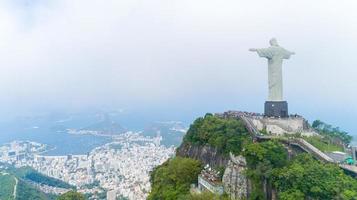 Rio de Janeiro, Rio de Janeiro, Brazil, Circa October 2019 Aerial view of Cristo Redentor, Christ the Redeemer Statue over Rio de Janeiro City, Brazil photo