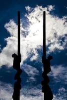 Silhouette pole climbing photo