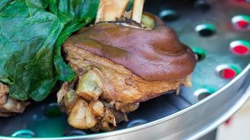 Steamed Pork leg with Chinese kale. photo