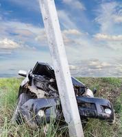 Car hits power pole. photo