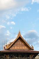 Thai roof scaffolding sky cloud. photo