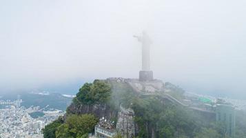 Rio de Janeiro, Rio de Janeiro, Brazil, Circa October 2019 Aerial view of Cristo Redentor, Christ the Redeemer Statue over Rio de Janeiro City, Brazil photo