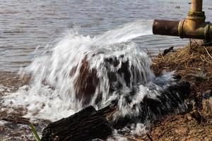 Water gushed jar timber. photo